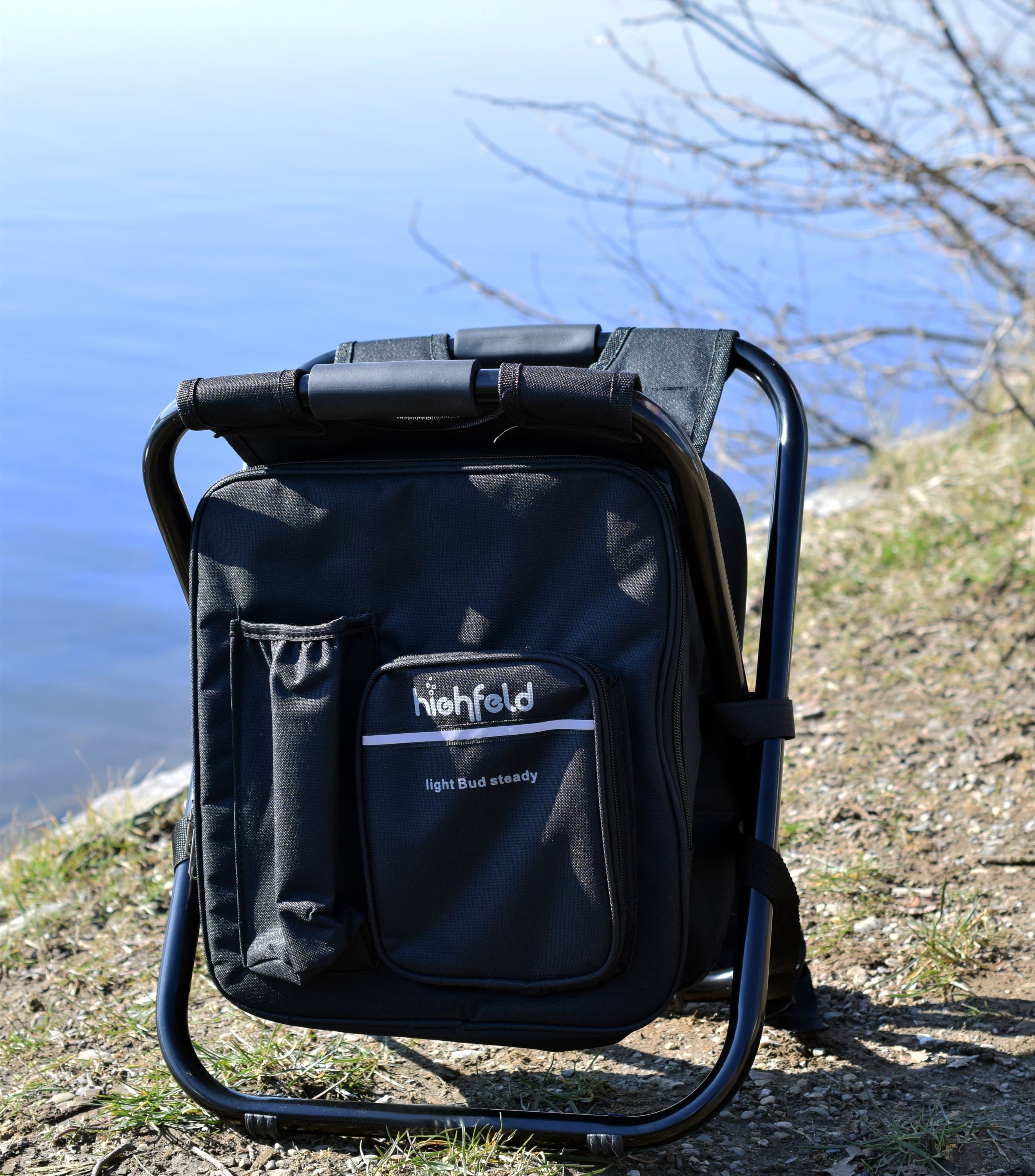 highfeld Camping Stuhl Hocker mit Rucksack black  Campinghocker Campingstuhl Rucksackstuhl